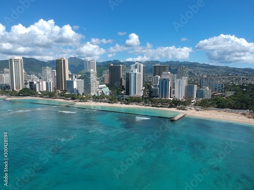 Panorama aerial view of Waikiki beach Hawaii USA white sandy beach turquoise blue waters luxury hotels and resorts 