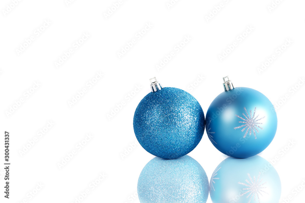 Two blue Christmas balls isolated on white Two blue Christmas balls isolated on white