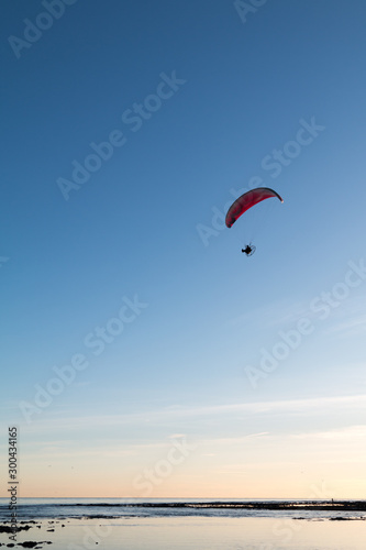 Paragliding on the beach