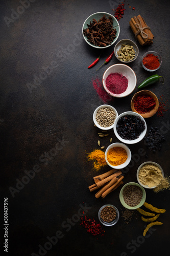 Fresh spice powder spice and peppers, background top view