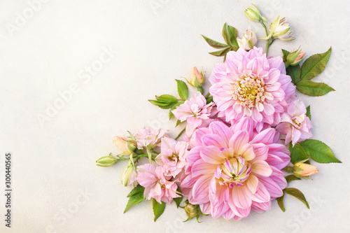 Summer blossoming delicate dahlia blooming flowers festive background, pastel and soft bouquet floral card, toned	