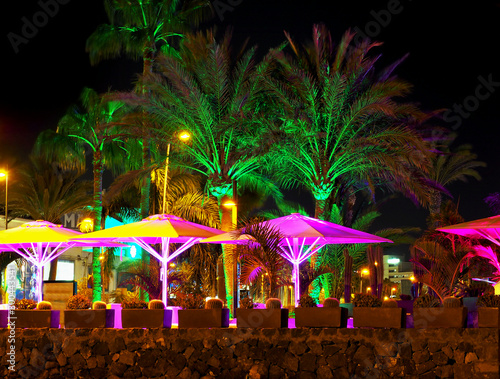 Promenade at the Playa de las Americas on tenerife at night. photo