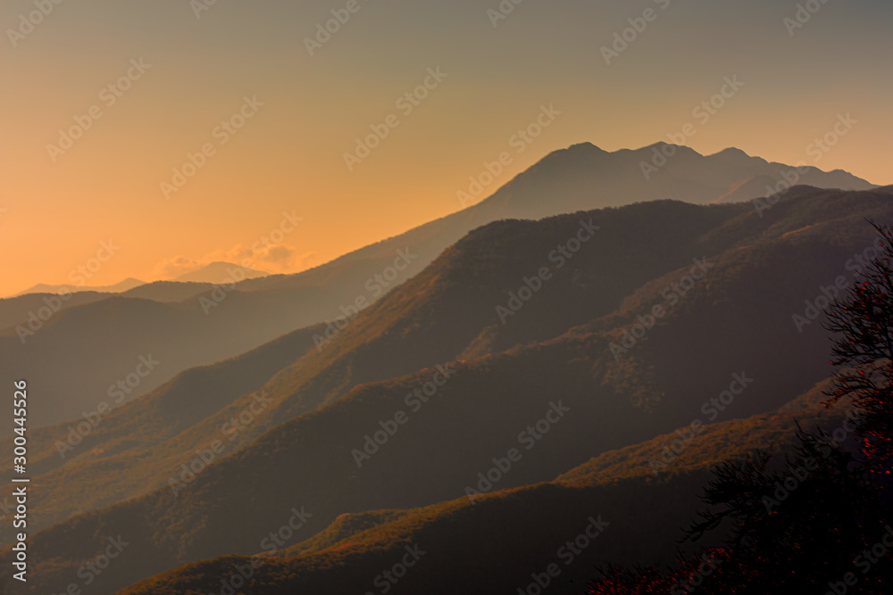 Autumn Mountains Landscape. Mountain peaks at sunset.