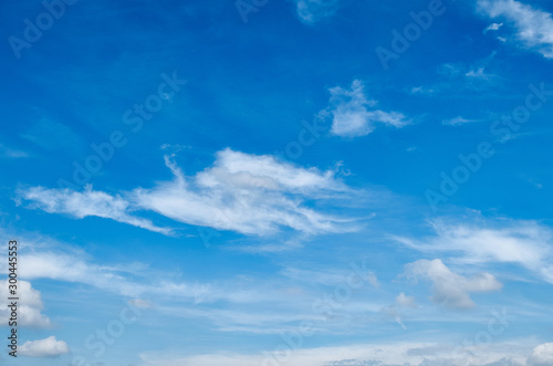 beautiful white cloud formation in bright blue sky as background