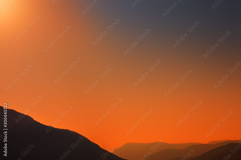 Obraz premium Mountains Landscape. Beautiful Mountain peaks at sunset. Panorama. Copy space