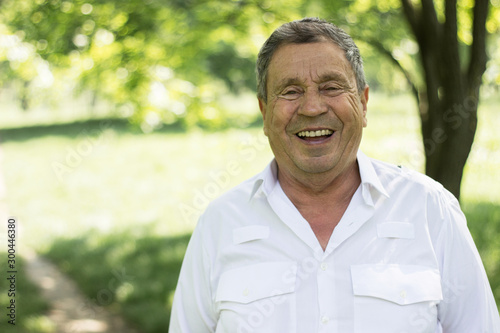 Portrait of charming senior man