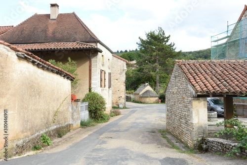 ols houses and farms on a street in a Burgundian village