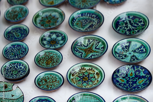 Blue pottery of Rishtan. Painting ceramic plates, glaze