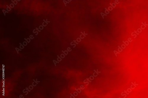 Abstract textured blurry background in red