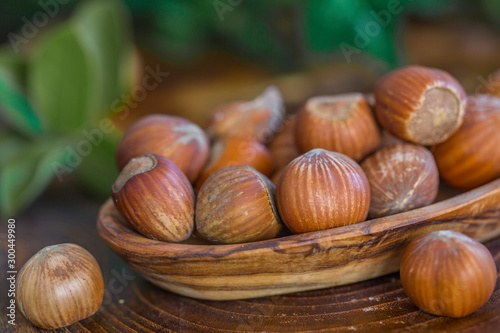 Close up of hazelnuts on wooden table