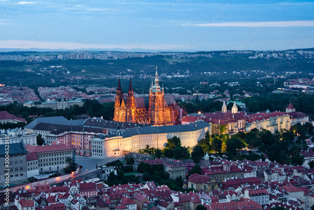 Aerial view of the city. St. Vitus Cathedral in the evening. Prague, Czech Republic
