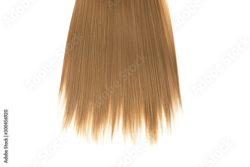 Brown hair close-up on white background, isolated