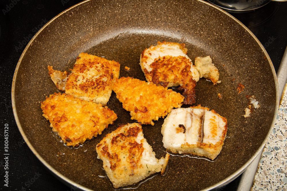 fish with egg and potatoes in the tray fish with egg and potatoes in the tray