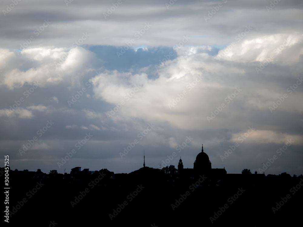 Silhouette of Galway Cathedral on bright sky background, Ireland.