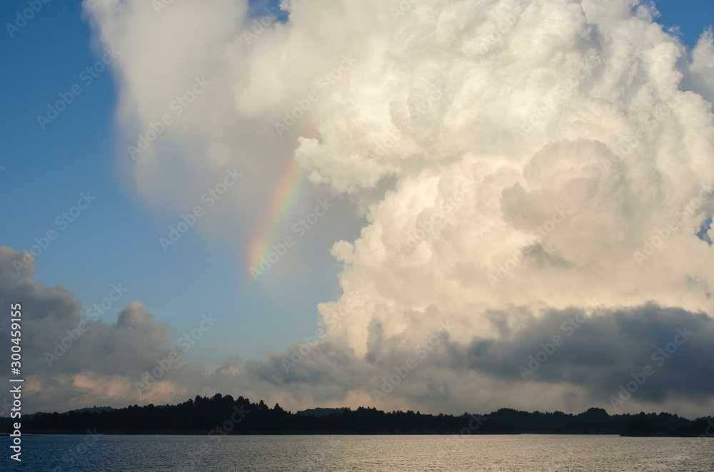 Lake, rainbow and amazing clouds