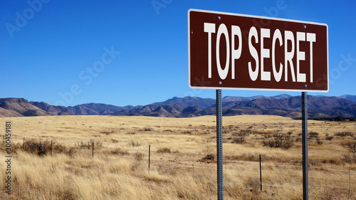 Top secret word on road sign