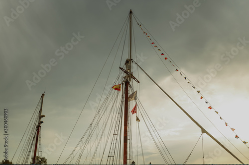 flag of countries in sailing boat traveling concept