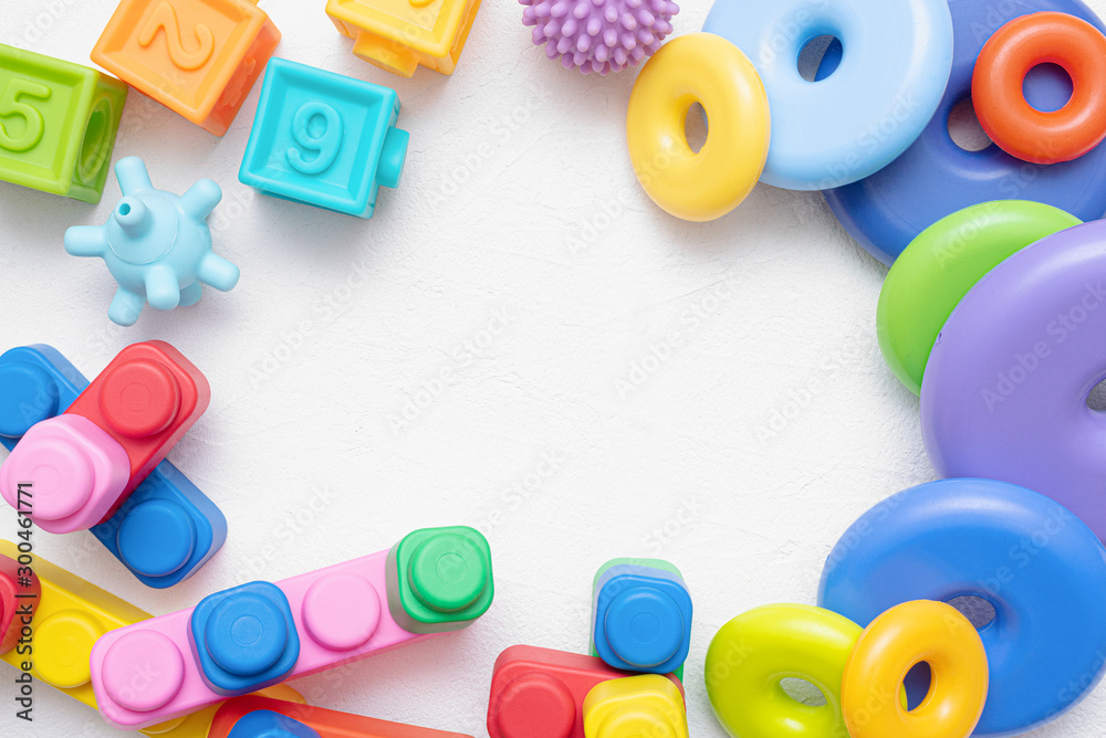 Naklejka premium Baby toys flat lay background with copy space.