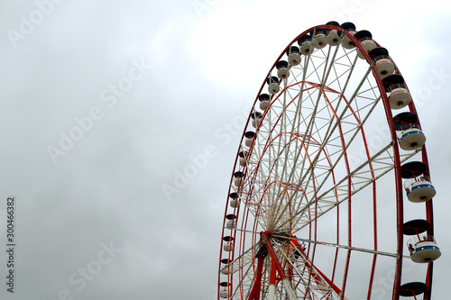 The ferris wheel ride attraction along with a small lighthouse for display in Miracle Park located on the Black Sea corniche shores in the seafront resort town