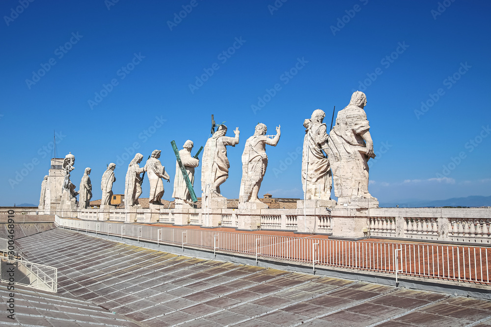 Statues of Jesus Christ, John the Baptist and 11 apostles on the roof of St. Peter's Cathedral