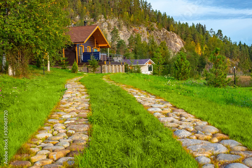 A stone road leads to the b...