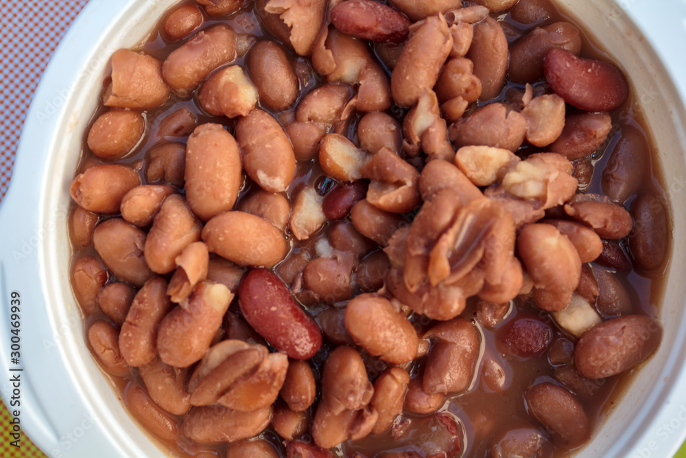 Top view of bowl with baked beans in the oven Top view of bowl with baked beans in the oven