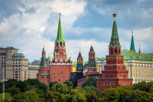 Moscow on a summer day. Kremlin. Towers of red stone. Grand Kremlin palace. Towers Of The Moscow Kremlin. Symbols of the capital of Russia. Summer trip to Russia.