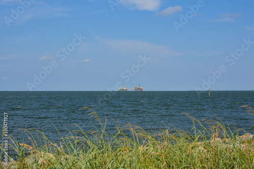 Fototapeta Offshore oil rig in Mobile Bay, Alabama