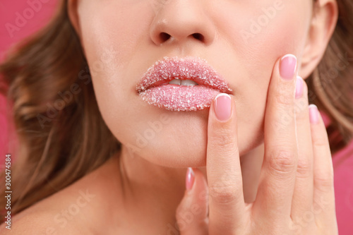 Beautiful young woman with sugar lips  closeup