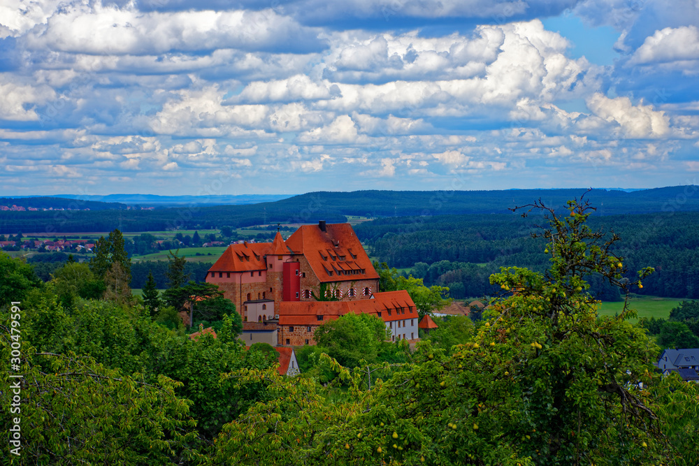 Beautiful sky with clouds over the ancient castle Burg Wernfels Beautiful sky with clouds over the ancient castle Burg Wernfels