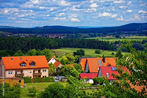 Wallpaper Mural Beautiful sky with clouds over the city near the forest Torontodigital.ca