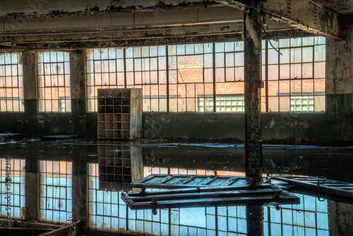 Εκτύπωση καμβά Interior of a room flooded with rain water with beautiful reflections