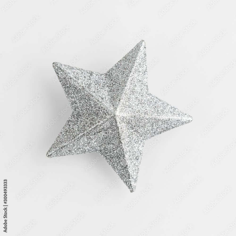 Obraz premium shining silver star in white