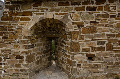 Embrasure, loophole in the wall of an old mountain fortress.