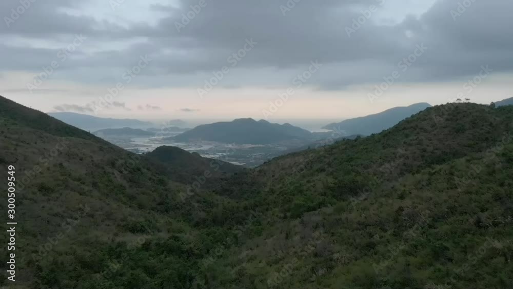 a flying camera flies over the jungles and mountains of Vietnam, with sunset views a flying camera flies over the jungles and mountains of Vietnam, with sunset views
