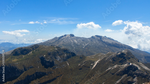 Panoramic view of the Guagua Pichincha volcano from the summit of the Rucu volcano on a sunny day