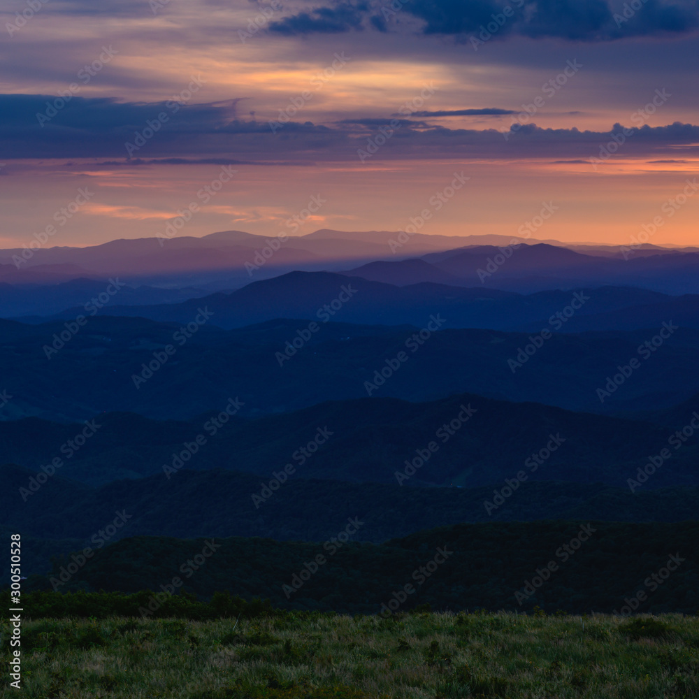 Grassy Field and Layers of Blue Ridge Mountains