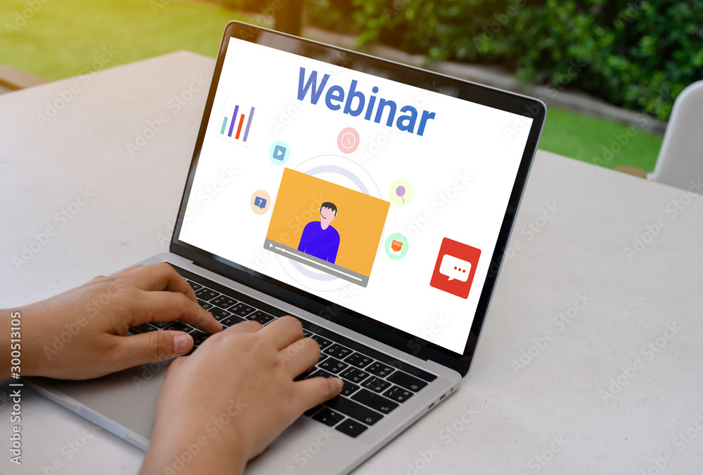 Person using a laptop computer for online training webinars. E-learning browsing connection and cloud online technology webcast concept. Laptop mockup with clipping path on screen. Person using a laptop computer for online training webinars. E-learning browsing connection and cloud online technology webcast concept. Laptop mockup with clipping path on screen.