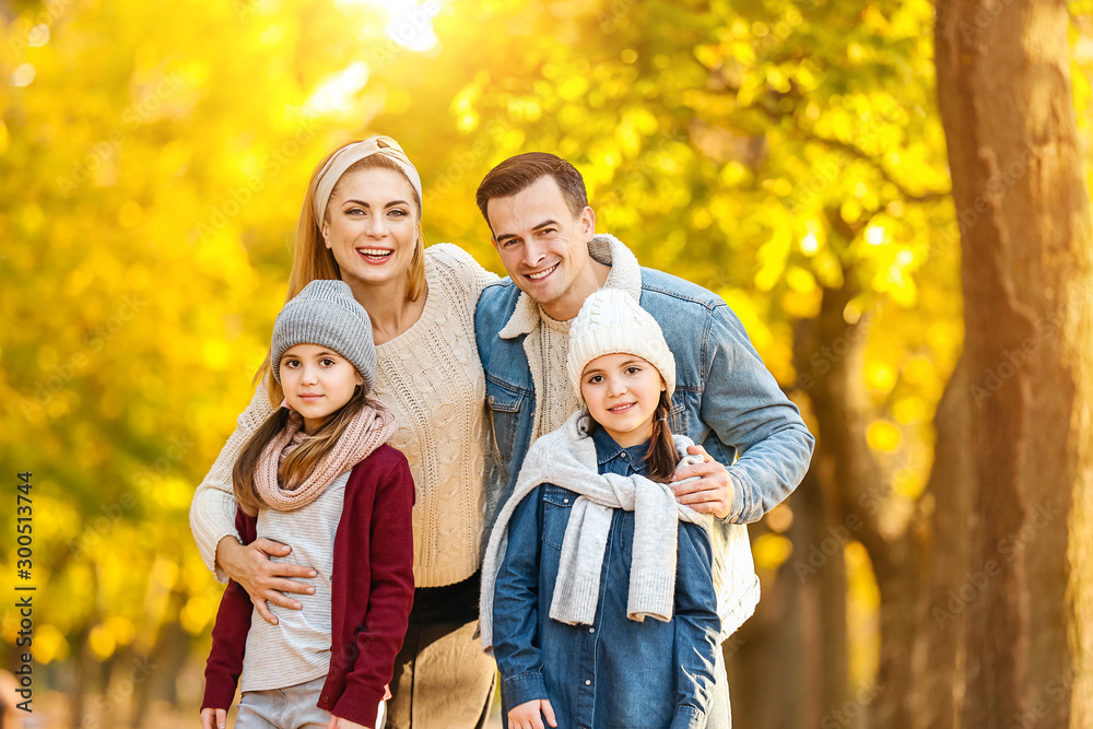 Portrait of happy family in autumn park Portrait of happy family in autumn park