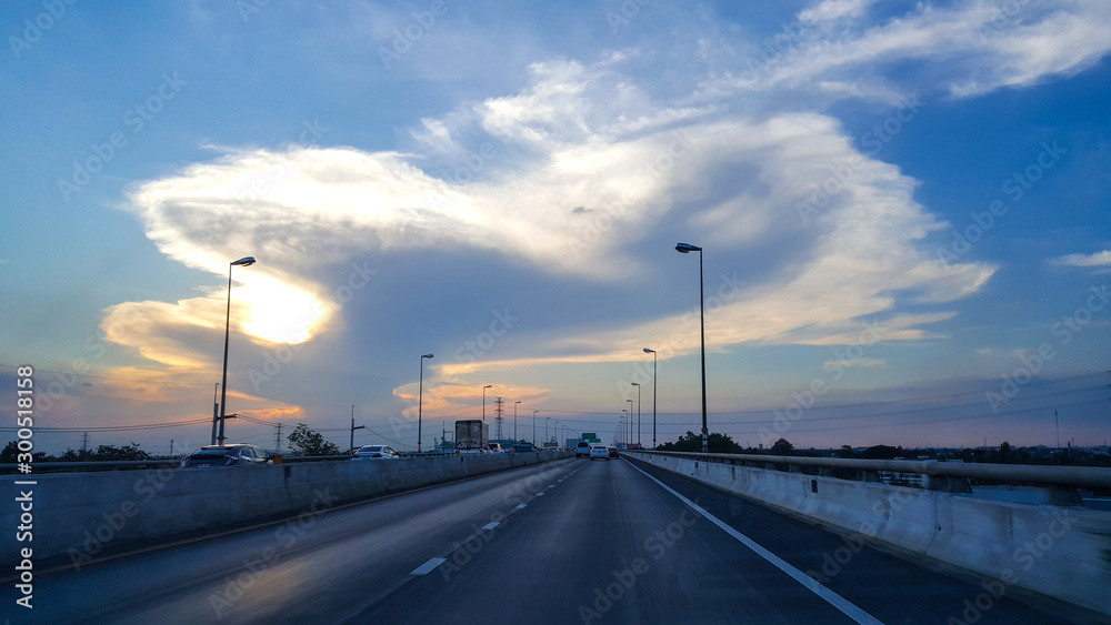 Sunset above high way , amazing sky color and cloud.