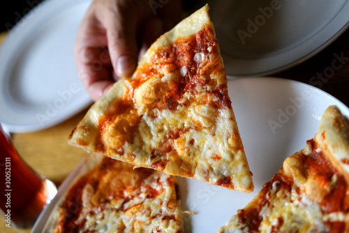 Photo macro of a tasty slice of pizza