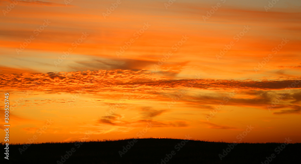 Fototapeta premium Beautiful photo red sunset with clouds landscape