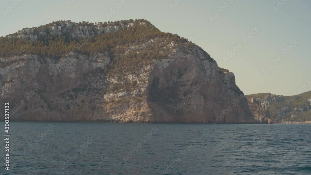 Incredibly beautiful rocky landscapes of the island of Ibiza from yacht. landscapes on the balearic islands. Es Vedra island Incredibly beautiful rocky landscapes of the island of Ibiza from yacht. landscapes on the balearic islands. Es Vedra island