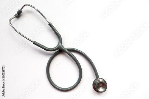 Stethoscope on a white background with space for text.