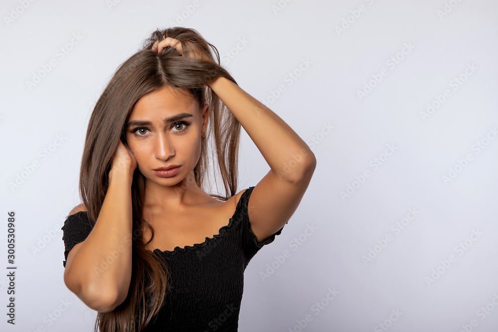 beautiful girl holding up with the concept of concern beautiful girl holding up with the concept of concern