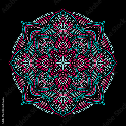 Graphic round mandala abstract isolated in black background.Boho indian shape.Ethnic oriental style. photo