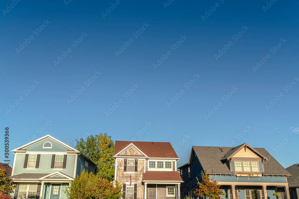 Row of three houses on a modern urban estate Row of three houses on a modern urban estate