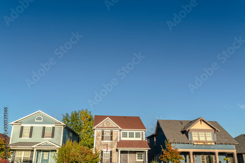 Row of three houses on a modern urban estate photo
