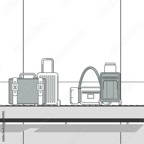 Various travel bags on baggage carousel at terminal airport