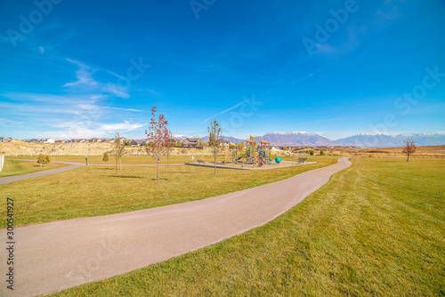 Photos Kids playground in a neatly landscaped park